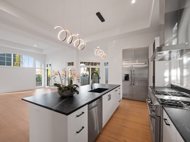 330 Ferndale Ave, Birmingham, MI 48009 - kitchen with premium appliances, wall chimney range hood, a sink, modern cabinets, and recessed lighting