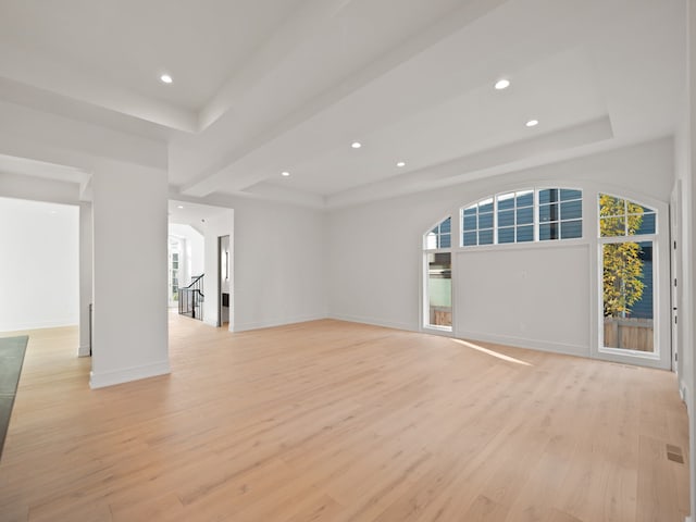 330 Ferndale Ave, Birmingham, MI 48009 - unfurnished living room with light wood finished floors, plenty of natural light, a tray ceiling, and recessed lighting