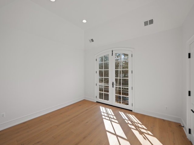 330 Ferndale Ave, Birmingham, MI 48009 - unfurnished room with french doors, wood finished floors, baseboards, and recessed lighting