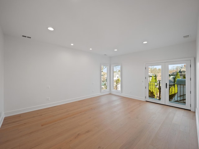 330 Ferndale Ave, Birmingham, MI 48009 - spare room with light wood finished floors, baseboards, recessed lighting, and french doors