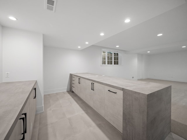 330 Ferndale Ave, Birmingham, MI 48009 - kitchen with modern cabinets, recessed lighting, baseboards, and light countertops