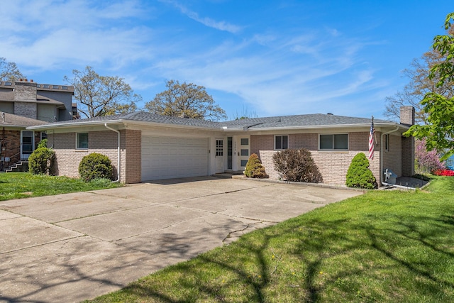 7262 Hatchery Rd, Waterford, MI 48327 - view of front of home featuring brick siding, an attached garage, driveway, and a chimney