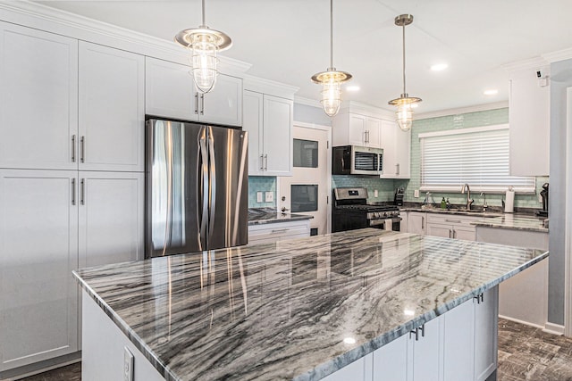 7262 Hatchery Rd, Waterford, MI 48327 - kitchen with appliances with stainless steel finishes, a sink, white cabinets, light stone counters, and tasteful backsplash