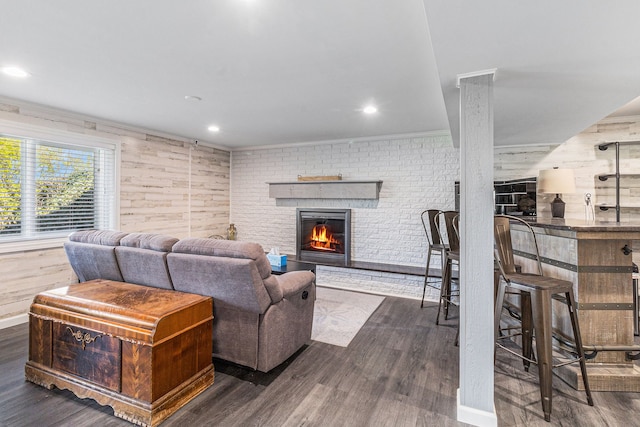7262 Hatchery Rd, Waterford, MI 48327 - living area featuring dark wood-type flooring, a fireplace, and recessed lighting