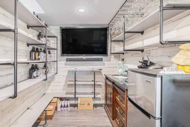 7262 Hatchery Rd, Waterford, MI 48327 - kitchen with freestanding refrigerator, open shelves, brown cabinets, light wood-style flooring, and recessed lighting