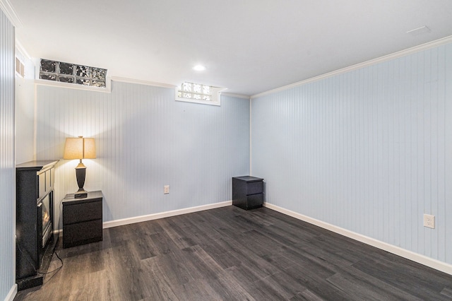 7262 Hatchery Rd, Waterford, MI 48327 - unfurnished room featuring ornamental molding, dark wood-style flooring, and baseboards