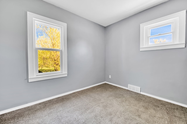 15430 Mendota St, Detroit, MI 48238 - empty room featuring carpet floors and baseboards