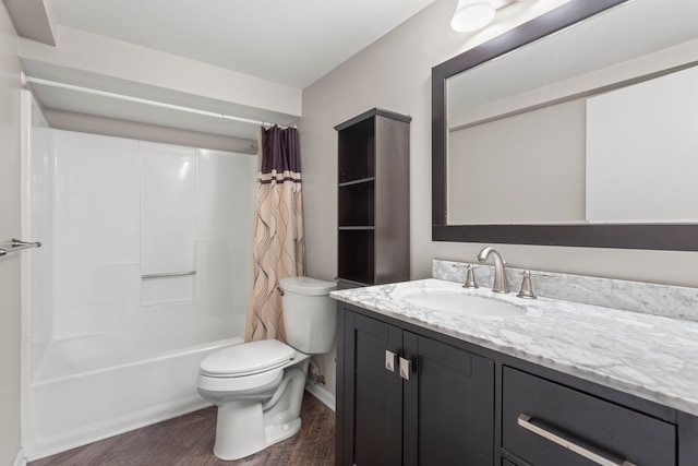 full bathroom with wood finished floors, toilet, vanity, shower / bathtub combination with curtain, and baseboards