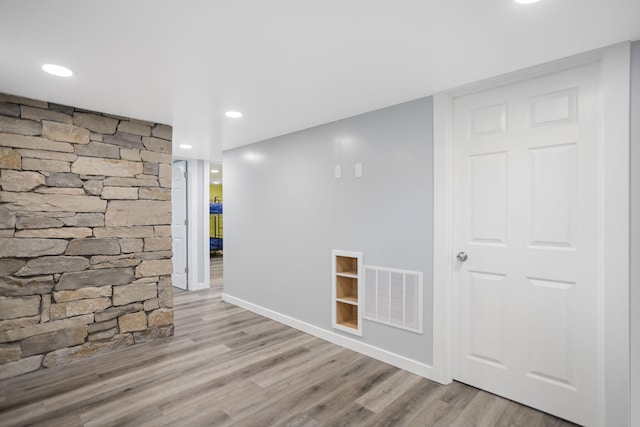 68687 M-43, South Haven, MI 49090 - hall with wood finished floors, baseboards, and recessed lighting