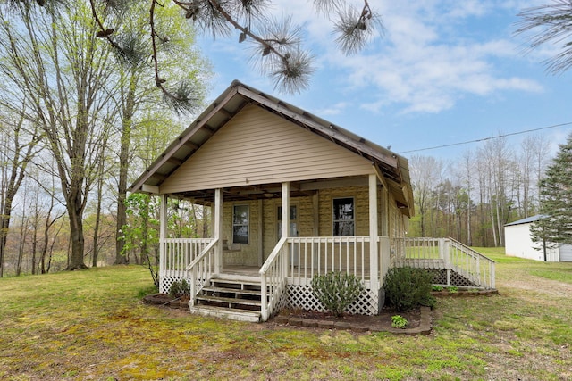 68687 M-43, South Haven, MI 49090 - view of front of property featuring a front yard and a porch