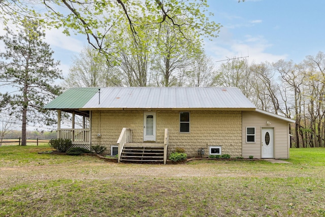68687 M-43, South Haven, MI 49090 - back of property featuring a yard, metal roof, and a deck