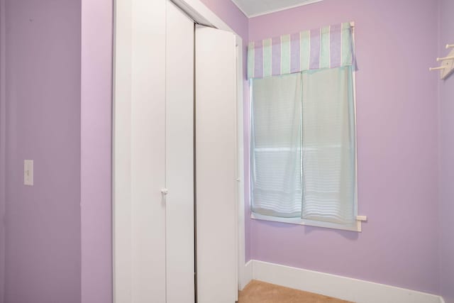 68687 M-43, South Haven, MI 49090 - unfurnished bedroom with baseboards, a closet, and light colored carpet
