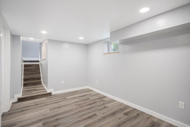 68687 M-43, South Haven, MI 49090 - basement with stairs, baseboards, wood finished floors, and recessed lighting