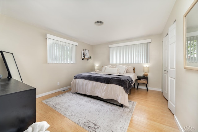 1961 Seminole Ln, Saginaw, MI 48638 - bedroom featuring light wood-style flooring and baseboards