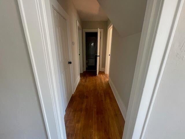 519 Whaley St, Cadillac, MI 49601 - hall with dark wood-type flooring and baseboards