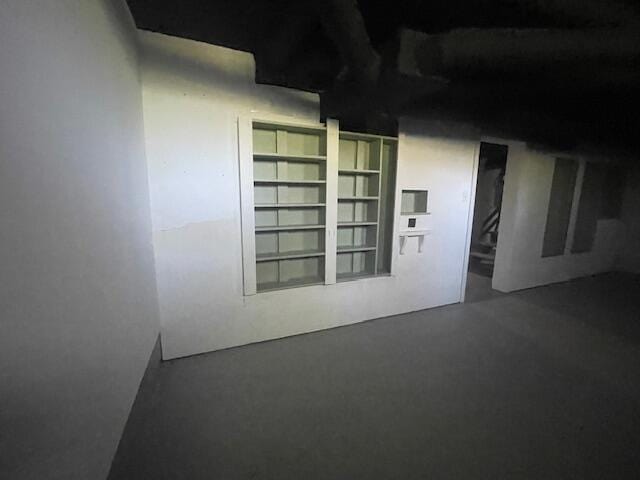 519 Whaley St, Cadillac, MI 49601 - empty room with concrete flooring