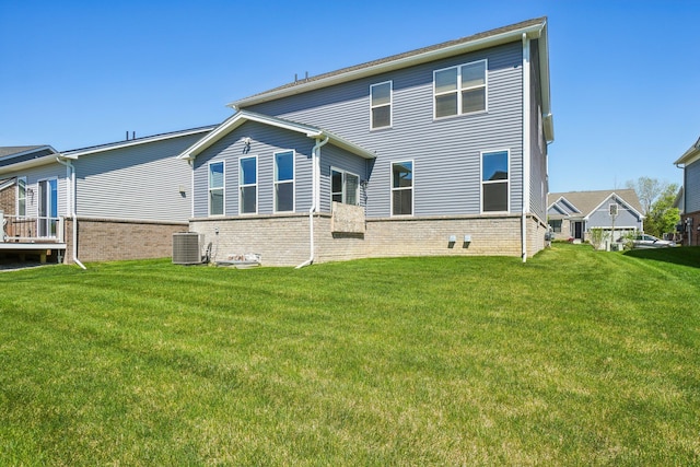 5534 Helmsdale Blvd, West Bloomfield, MI 48322 - back of property with a lawn, central AC unit, and brick siding