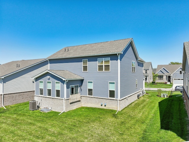5534 Helmsdale Blvd, West Bloomfield, MI 48322 - rear view of house with a lawn and cooling unit