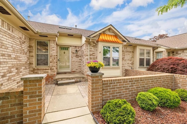 43389 Riverbend Blvd, Clinton Township, MI 48038 - property entrance with brick siding and roof with shingles