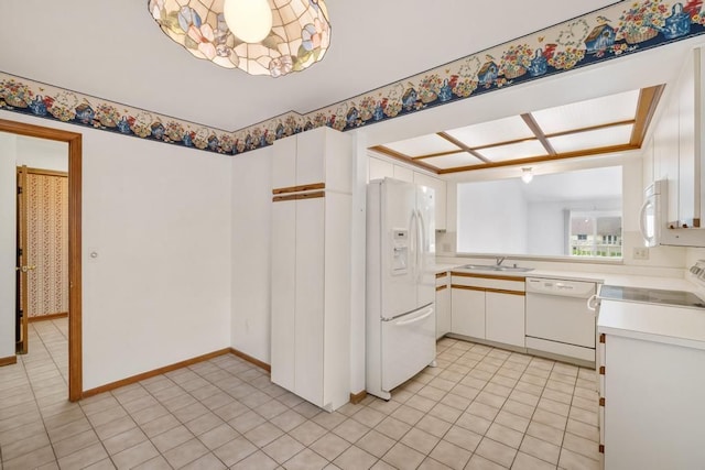 43389 Riverbend Blvd, Clinton Township, MI 48038 - kitchen featuring white appliances, a sink, light countertops, white cabinetry, and light tile patterned flooring