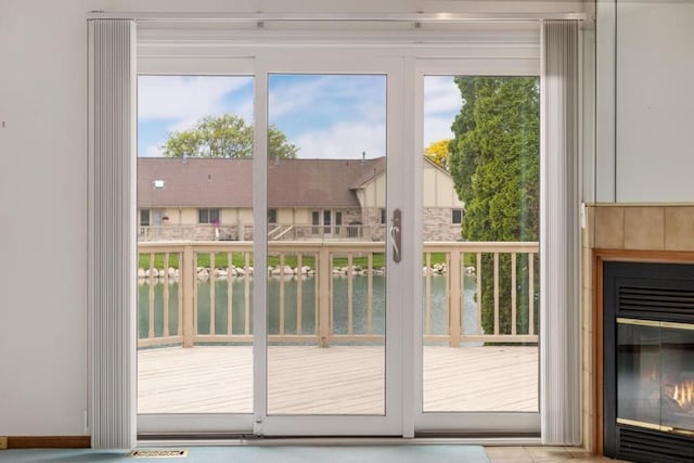 43389 Riverbend Blvd, Clinton Township, MI 48038 - entryway featuring a water view and a glass covered fireplace