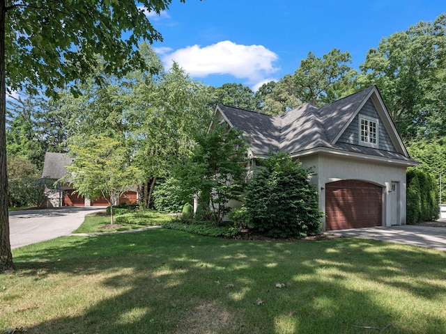 3418 Westchester Rd, Bloomfield Hills, MI 48304 - view of property exterior with a lawn, driveway, a garage, and roof with shingles