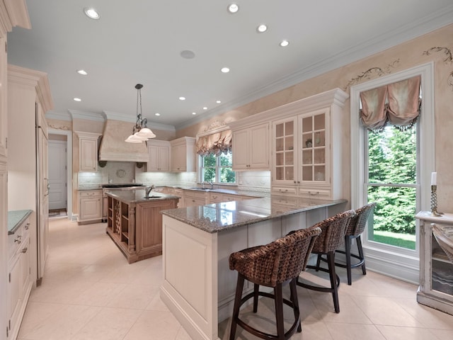 3418 Westchester Rd, Bloomfield Hills, MI 48304 - kitchen with premium range hood, plenty of natural light, backsplash, a sink, and ornamental molding