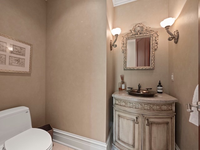 3418 Westchester Rd, Bloomfield Hills, MI 48304 - bathroom with toilet, vanity, and tile patterned floors