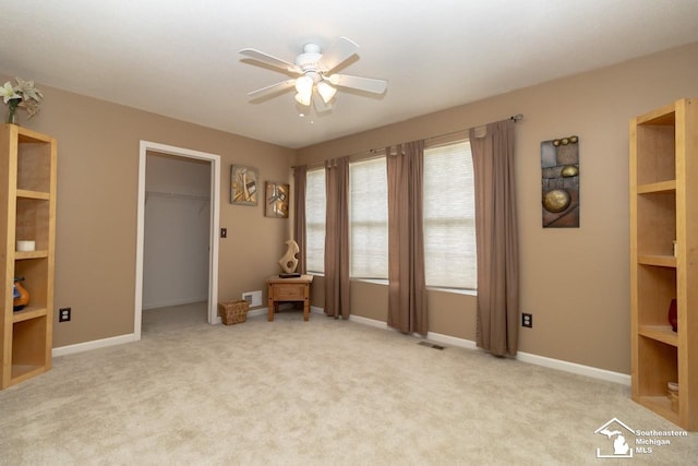1786 Arbor Creek Dr, Monroe, MI 48162 - spare room with a ceiling fan, light carpet, and baseboards