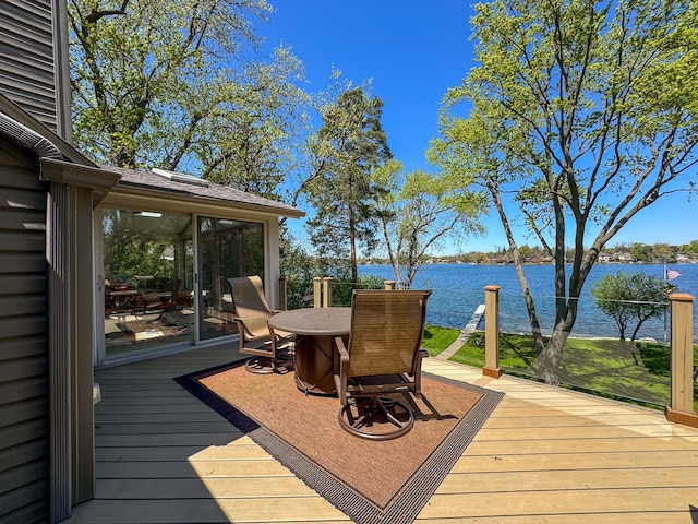 2660 Silverdown Ct, Waterford, MI 48328 - deck with a water view, a sunroom, and outdoor dining space