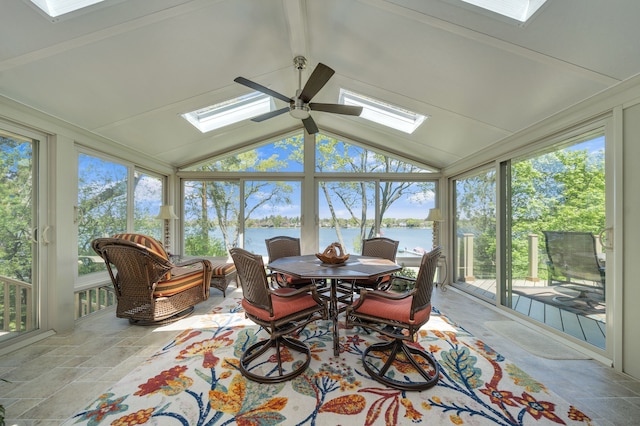 2660 Silverdown Ct, Waterford, MI 48328 - sunroom with a skylight, a water view, vaulted ceiling, and plenty of natural light