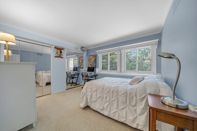 2660 Silverdown Ct, Waterford, MI 48328 - carpeted bedroom with crown molding and two closets