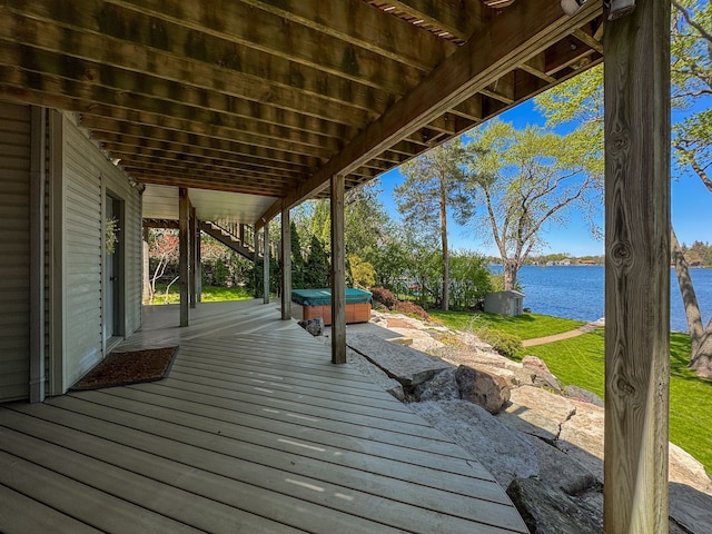 2660 Silverdown Ct, Waterford, MI 48328 - deck with a hot tub and a water view