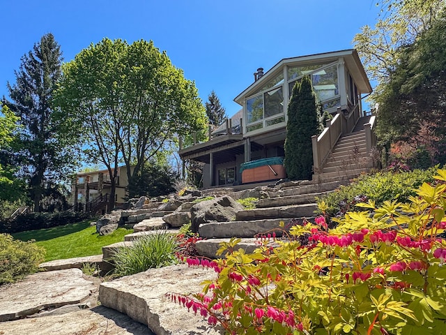 2660 Silverdown Ct, Waterford, MI 48328 - rear view of house with stairway and a deck