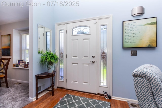25380 Tara Ln, Flat Rock, MI 48134 - entrance foyer featuring wood finished floors and baseboards