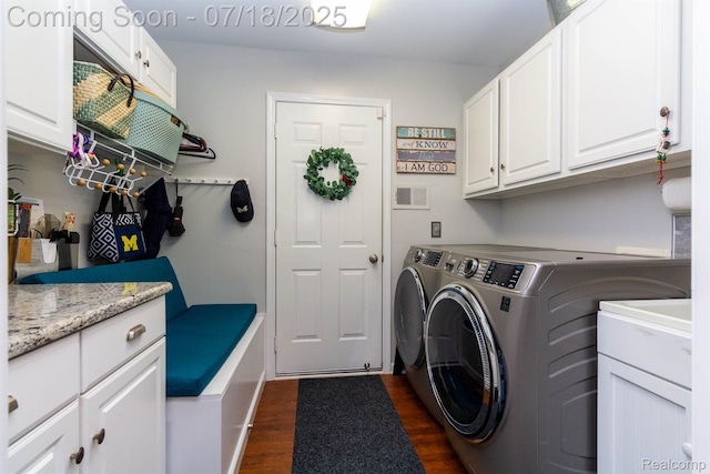 25380 Tara Ln, Flat Rock, MI 48134 - washroom with washing machine and dryer, cabinet space, and dark wood-type flooring