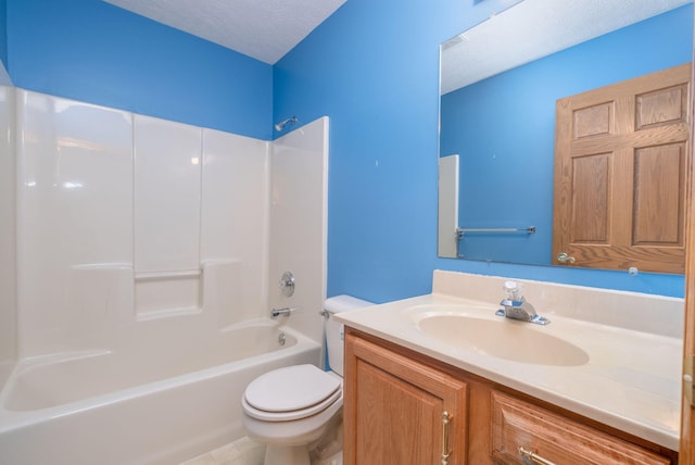 11021 Heather Ln, Canadian Lakes, MI 49346 - bathroom with toilet, vanity, shower / bathtub combination, and a textured ceiling