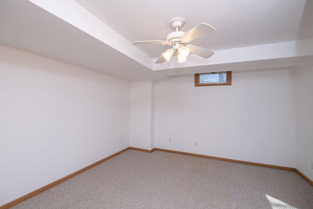11021 Heather Ln, Canadian Lakes, MI 49346 - spare room with light carpet, baseboards, and a ceiling fan