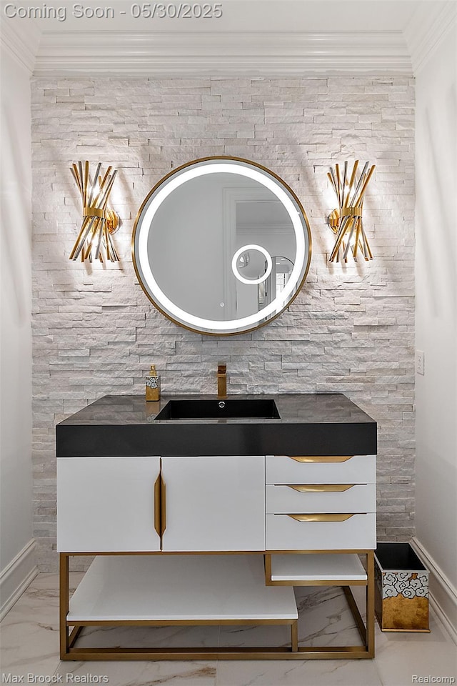 222 Arlington St, Birmingham, MI 48009 - detailed view of a sink, ornamental molding, and baseboards
