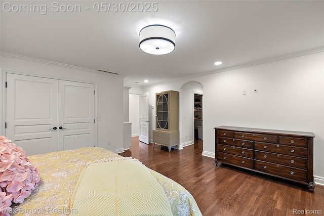 222 Arlington St, Birmingham, MI 48009 - bedroom featuring a closet, crown molding, wood finished floors, baseboards, and recessed lighting