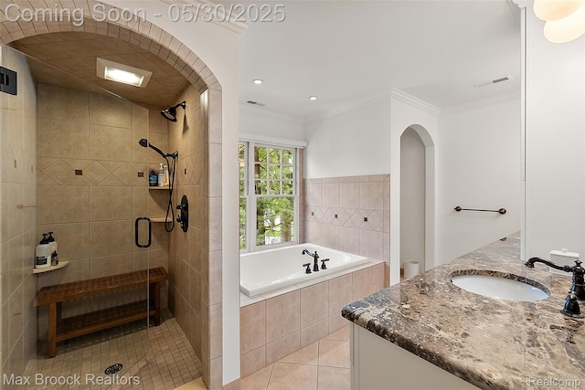 222 Arlington St, Birmingham, MI 48009 - full bath with a bath, vanity, a stall shower, tile patterned floors, and crown molding
