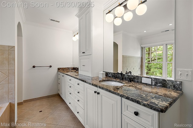 222 Arlington St, Birmingham, MI 48009 - full bathroom featuring double vanity, tile patterned flooring, crown molding, and baseboards