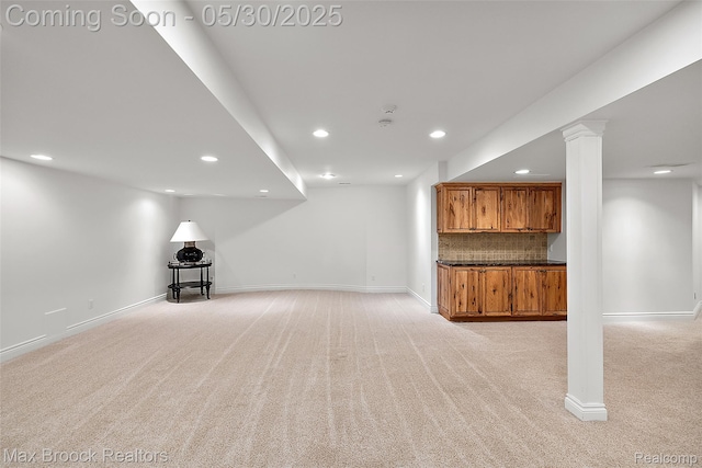 222 Arlington St, Birmingham, MI 48009 - finished below grade area with light colored carpet, recessed lighting, and baseboards