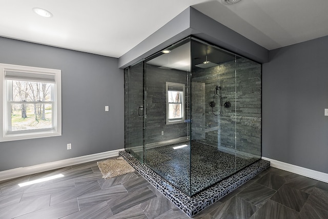 5060 Pratt Rd, Metamora, MI 48455 - full bathroom featuring a shower stall and baseboards