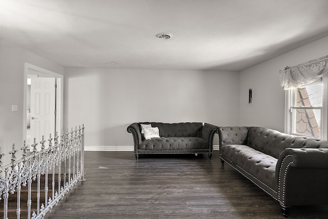 5060 Pratt Rd, Metamora, MI 48455 - living area with wood finished floors and baseboards