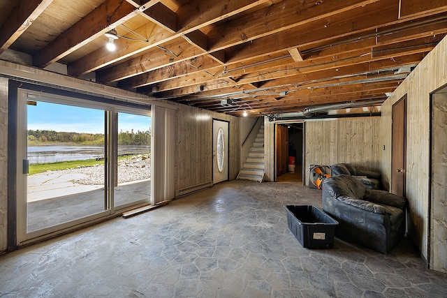 5060 Pratt Rd, Metamora, MI 48455 - below grade area featuring stairs and stone floors