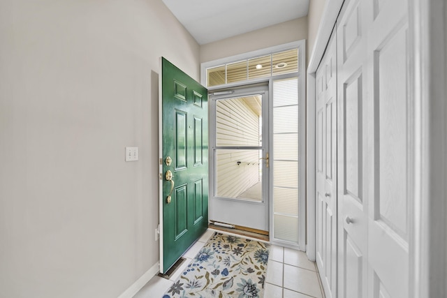 3605 Terrace Hills Ln, Jackson, MI 49203 - doorway with light tile patterned floors and baseboards