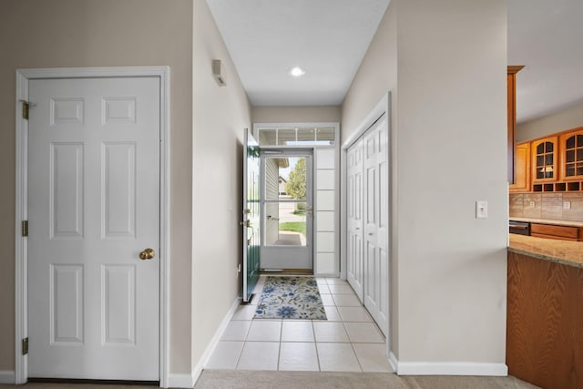 3605 Terrace Hills Ln, Jackson, MI 49203 - entrance foyer featuring baseboards, light tile patterned floors, and recessed lighting
