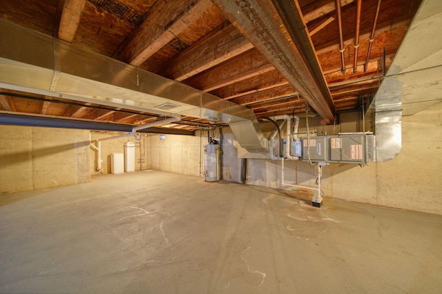 3605 Terrace Hills Ln, Jackson, MI 49203 - unfinished basement featuring water heater