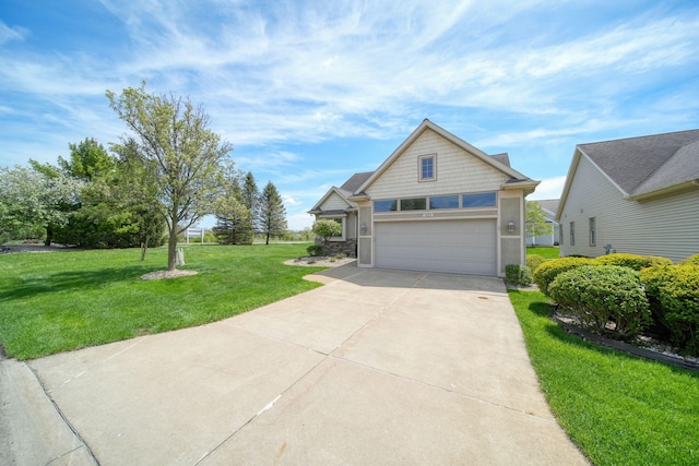 3605 Terrace Hills Ln, Jackson, MI 49203 - view of front of home featuring a garage, driveway, and a front yard